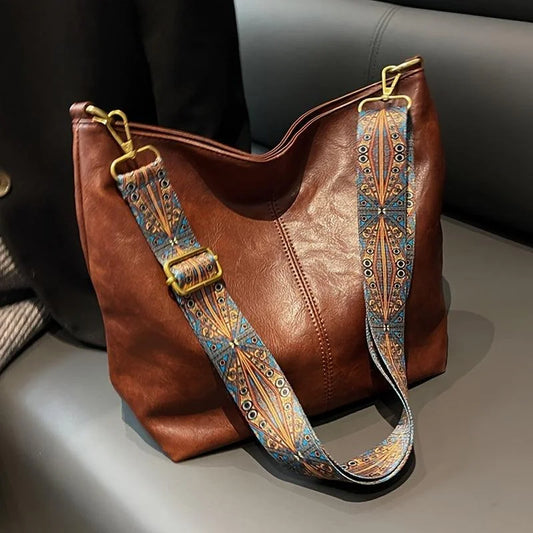Women's faux-leather hobo bag with bohemian-patterned wide strap – Brown
