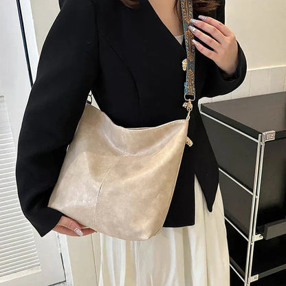 Women's faux-leather hobo bag with bohemian-patterned wide strap