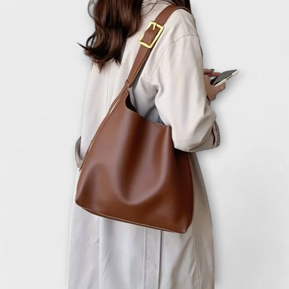 Women's faux leather hobo shoulder bag with adjustable buckle strap