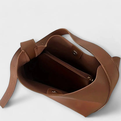 Women's faux leather hobo shoulder bag with adjustable buckle strap