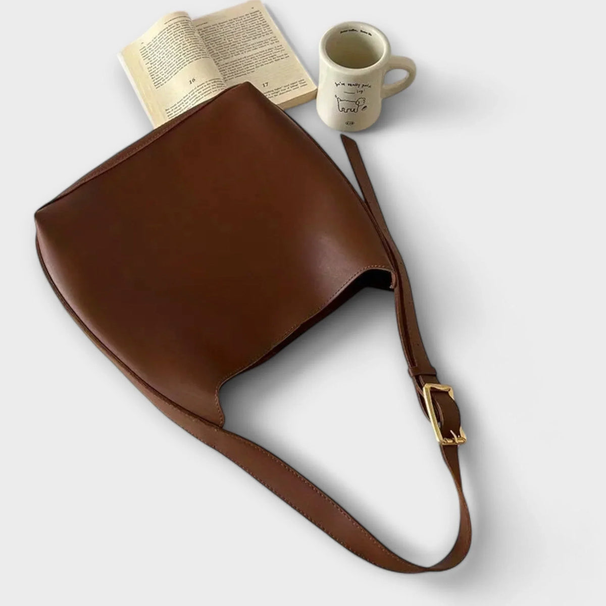 Women's faux leather hobo shoulder bag with adjustable buckle strap