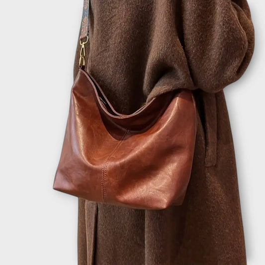 Women's faux-leather hobo shoulder bag with wide geometric strap