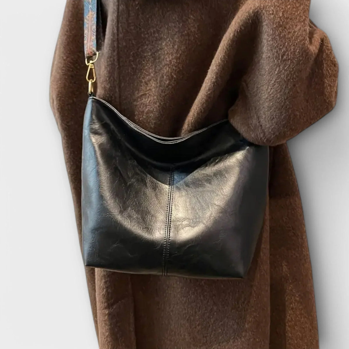 Women's faux-leather hobo shoulder bag with wide geometric strap