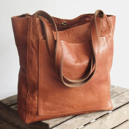 Women's leather tote bag with magnetic snap closure and front patch pocket – Brown