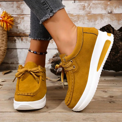Women's suede platform lace-up sneakers with moc-toe stitching