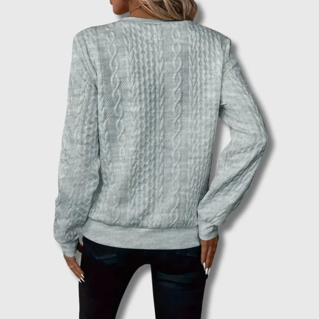 Women's cable-knit sweater with quarter-zip long-sleeve and ribbed cuffs