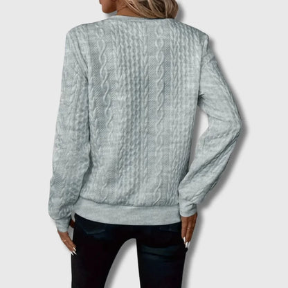 Women's cable-knit sweater with quarter-zip long-sleeve and ribbed cuffs