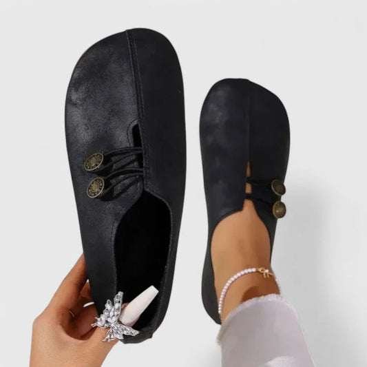 Women's casual distressed slip-on loafers with button-loop detail – Black