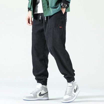 Women's classic corduroy joggers with drawstring waist and elastic cuffs – Black