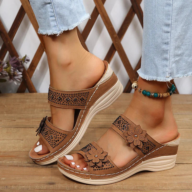 Women's comfort faux suede perforated wedge slides with floral appliqué – Light Brown