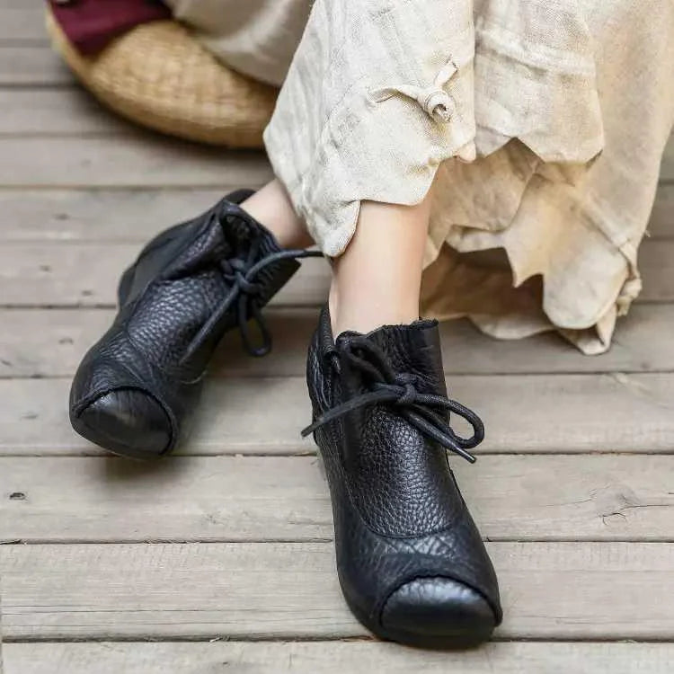 Women's comfort leather ankle boots with fuzzy lining and lace-up closure