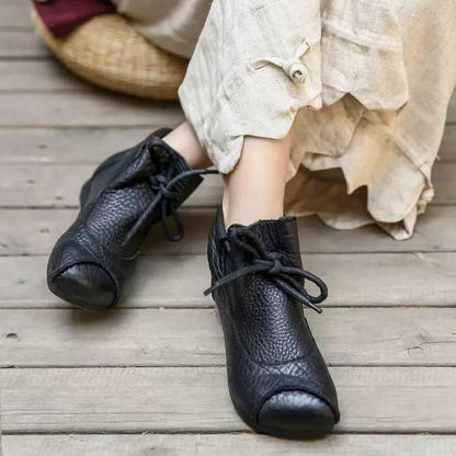 Women's comfort leather ankle boots with fuzzy lining and lace-up closure