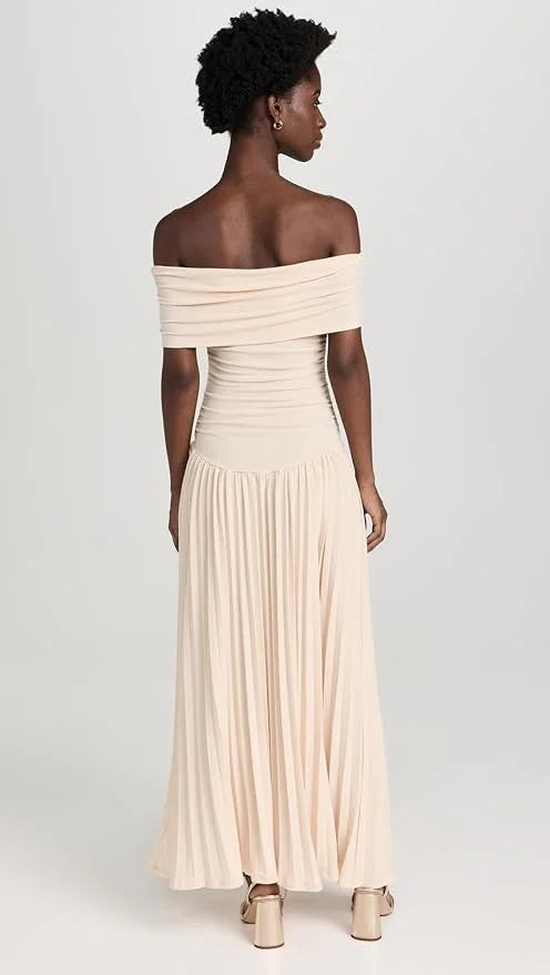 Women's flowy summer maxi dress with off-shoulder neckline and pleated skirt