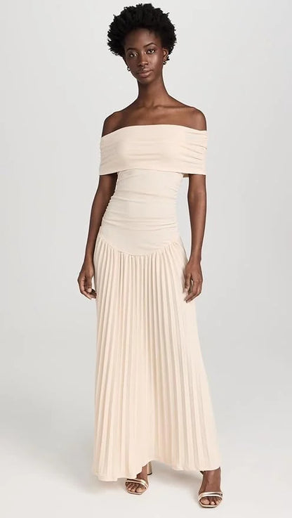 Women's flowy summer maxi dress with off-shoulder neckline and pleated skirt