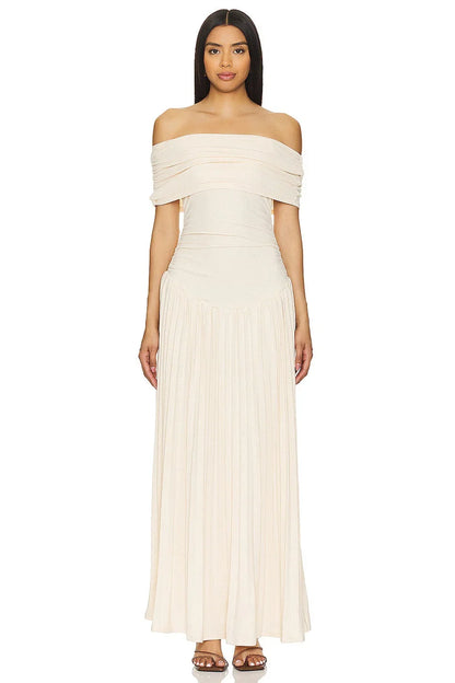 Women's flowy summer maxi dress with off-shoulder neckline and pleated skirt
