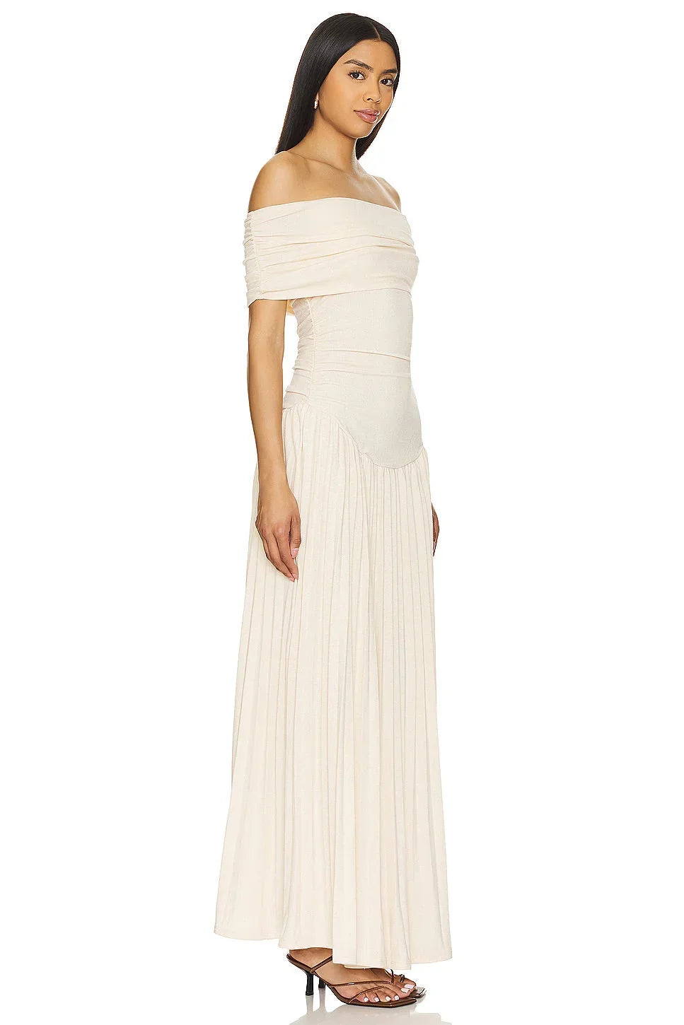Women's flowy summer maxi dress with off-shoulder neckline and pleated skirt