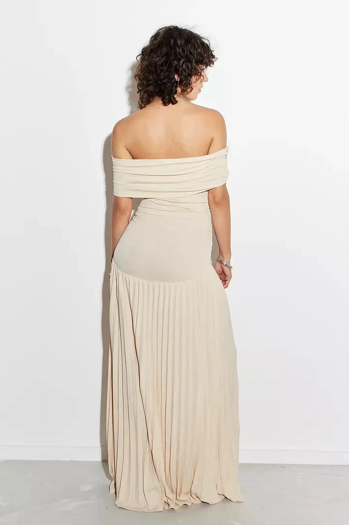 Women's flowy summer maxi dress with off-shoulder neckline and pleated skirt