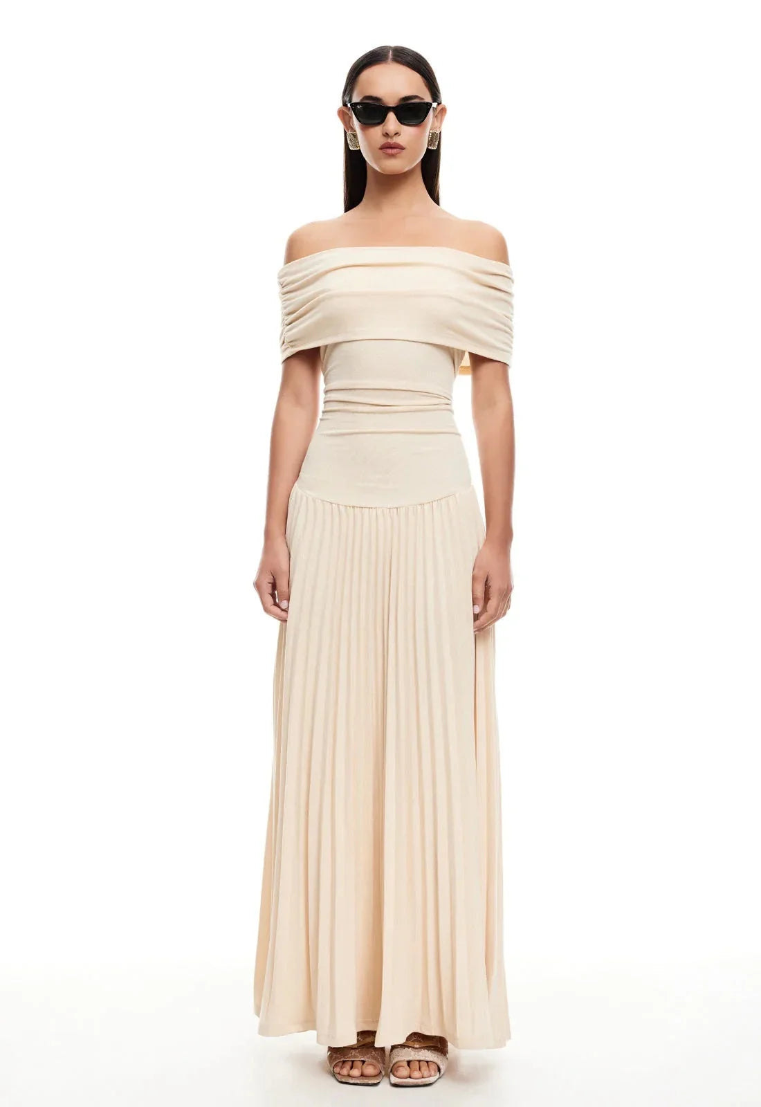Women's flowy summer maxi dress with off-shoulder neckline and pleated skirt