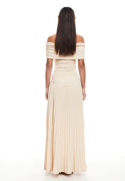Women's flowy summer maxi dress with off-shoulder neckline and pleated skirt