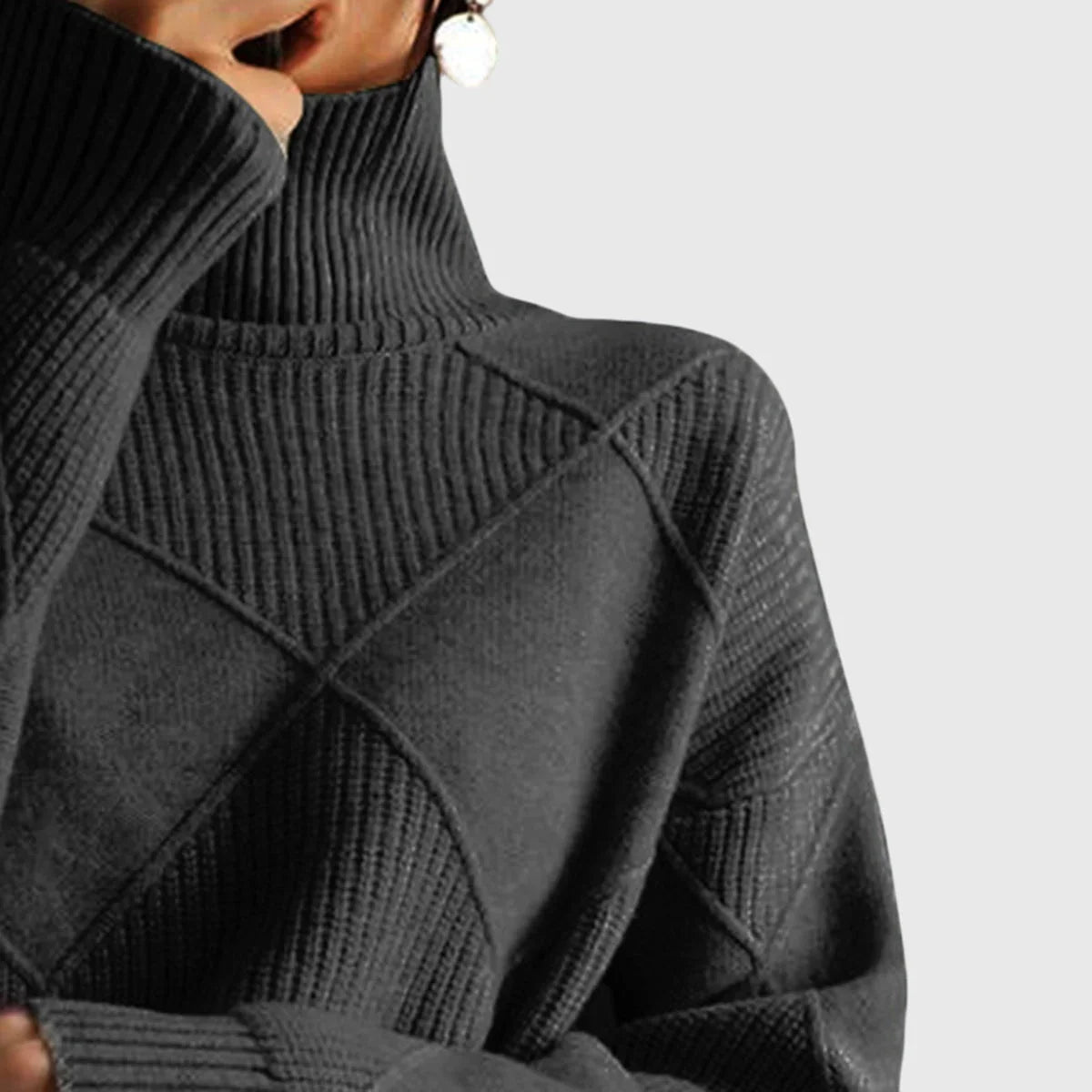 Women's diamond-pattern knit sweater with turtleneck and ribbed cuffs