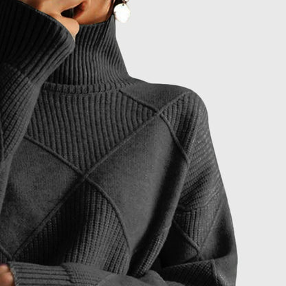 Women's diamond-pattern knit sweater with turtleneck and ribbed cuffs
