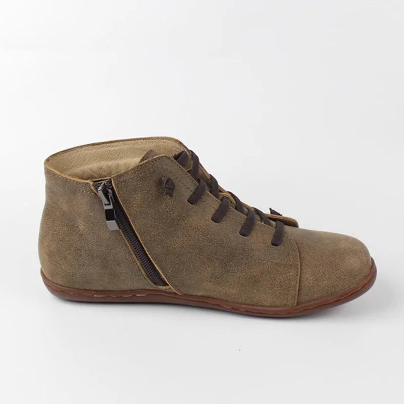 Women's distressed leather ankle boots with side zipper and lace-up front