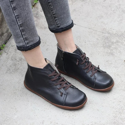 Women's distressed leather ankle boots with side zipper and lace-up front – Black