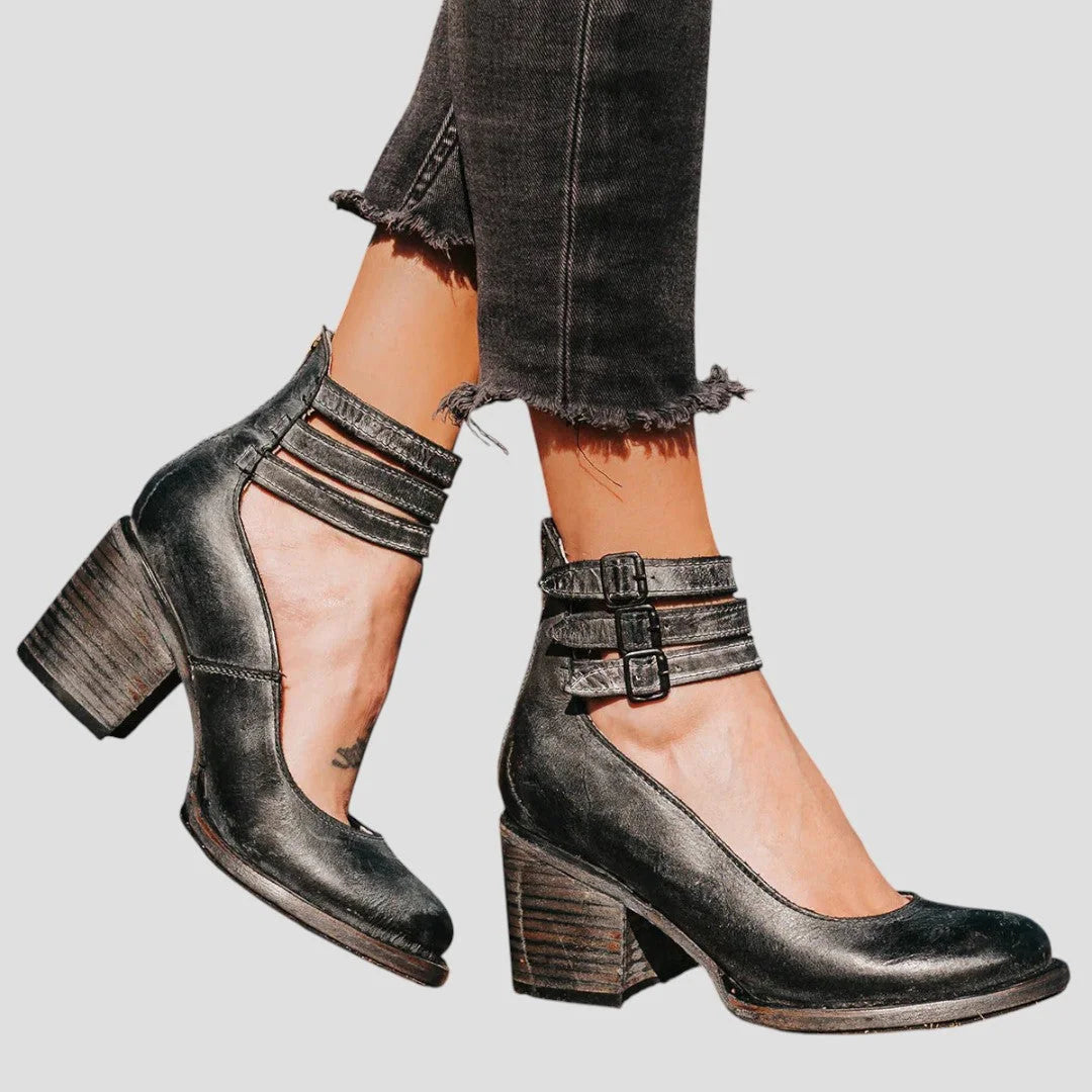 Women's distressed leather cut-out boots with triple-buckle ankle straps – Black