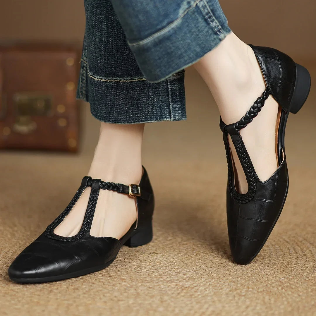 Women's embossed leather pointed-toe T-strap Mary Jane flats with braided buckle – Black