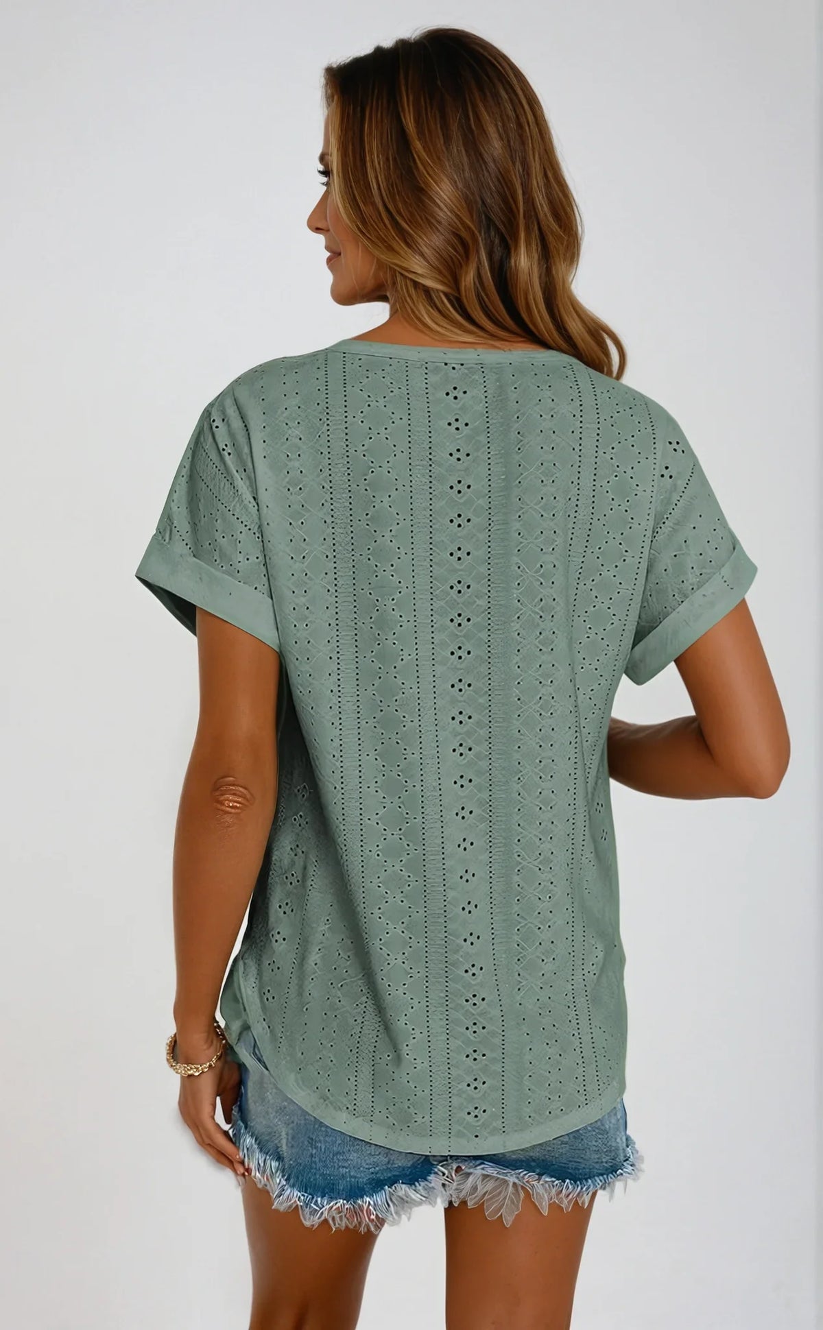 Women's eyelet short-sleeve top with crew-neck and cuffed sleeves