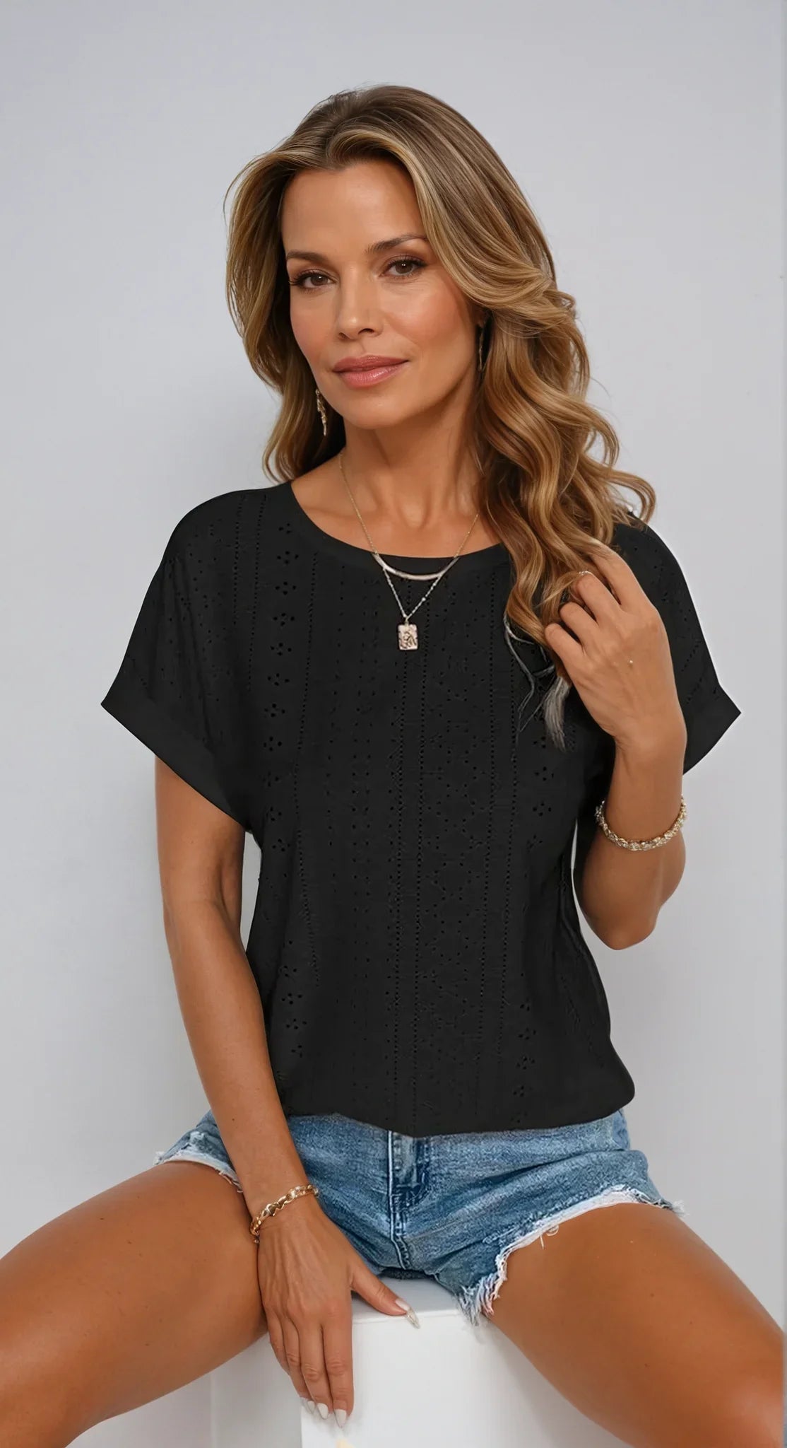 Women's eyelet short-sleeve top with crew-neck and cuffed sleeves – Black (Almost sold out)