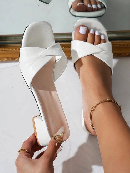 Women's faux leather block-heel slide sandals with crossover strap and open toe