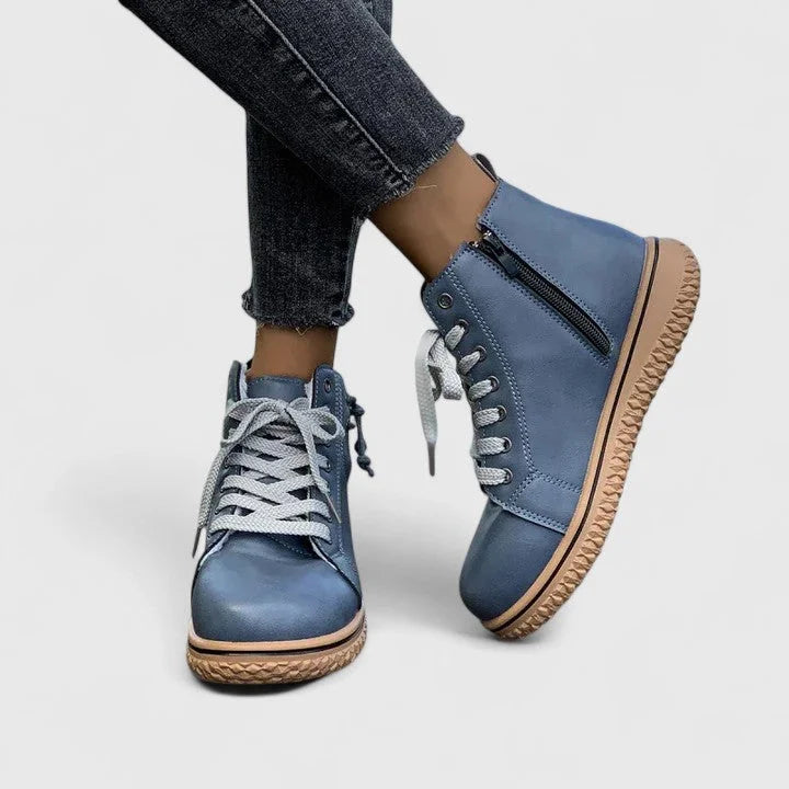 Women's faux leather lace-up ankle boots with a chunky ridged sole