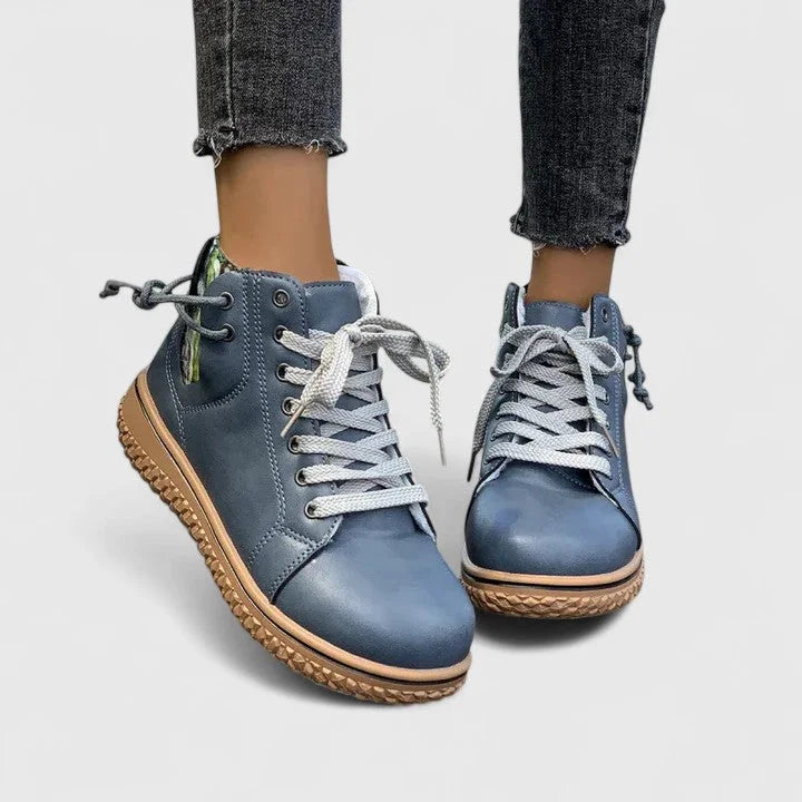 Women's faux leather lace-up ankle boots with a chunky ridged sole