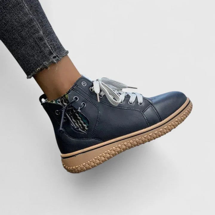Women's faux leather lace-up ankle boots with a chunky ridged sole