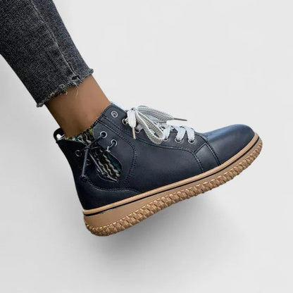 Women's faux leather lace-up ankle boots with a chunky ridged sole