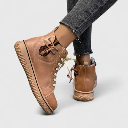Women's faux leather lace-up ankle boots with a chunky ridged sole