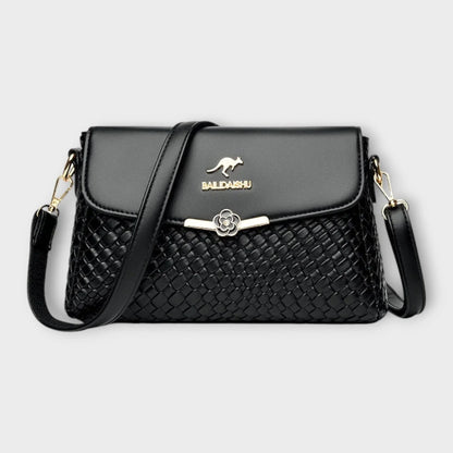 Women's faux leather woven texture shoulder bag with flap closure and adjustable strap – Black