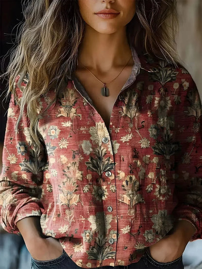 Women's floral collared button-down shirt with long sleeves and chest pockets