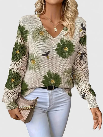 Women's floral knit sweater with V-neck and long open-knit sleeves