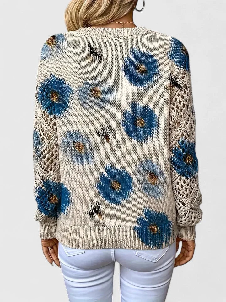 Women's floral knit sweater with V-neck and long open-knit sleeves