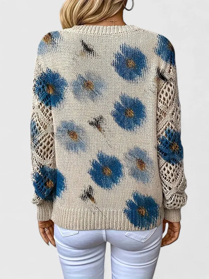 Women's floral knit sweater with V-neck and long open-knit sleeves