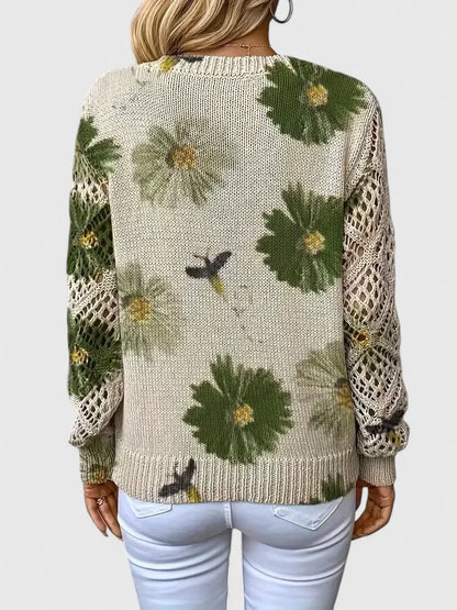 Women's floral knit sweater with V-neck and long open-knit sleeves