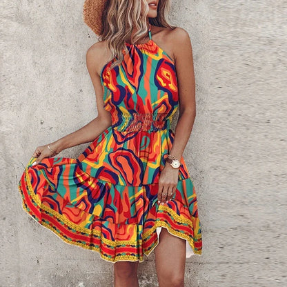 Women's floral-patterned flowy mini dress with halter neckline and smocked waist – Orange