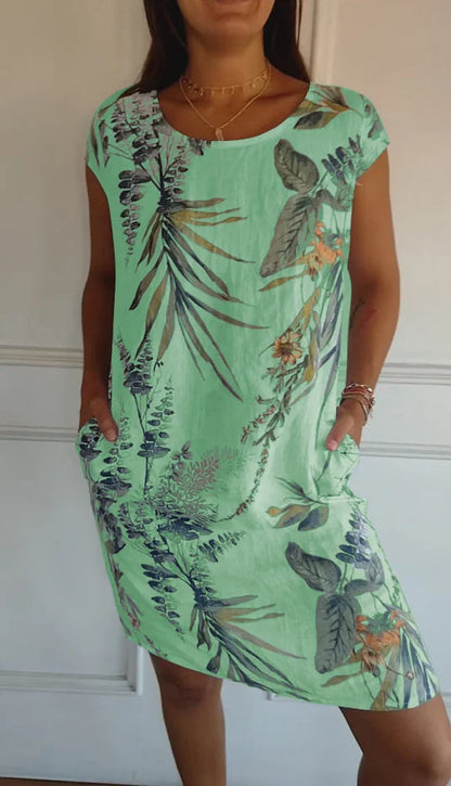 Women's floral print mini dress with round-neck short sleeves and side pockets – Green