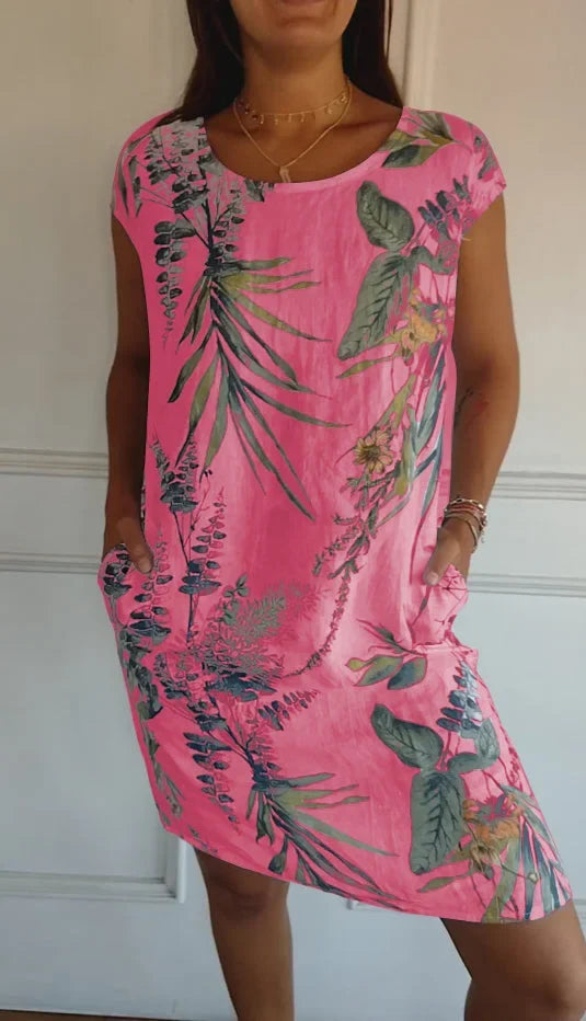 Women's floral print mini dress with round-neck short sleeves and side pockets – Pink