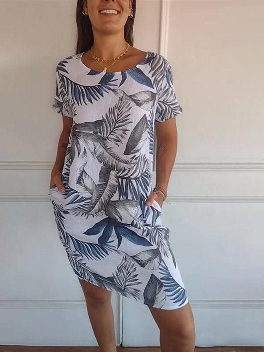Women's floral print mini dress with round-neck short sleeves and side pockets – White 2