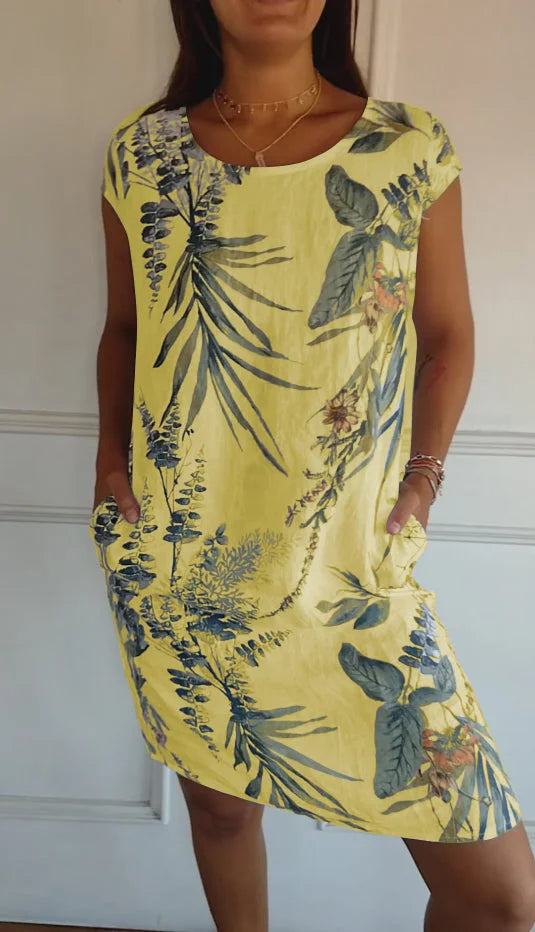 Women's floral print mini dress with round-neck short sleeves and side pockets – Yellow