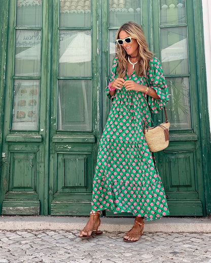 Women's floral print tiered maxi dress with V-neck and 3/4-length puff sleeves