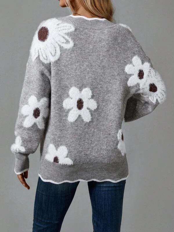 Women's floral pullover knit sweater with V-neck, scalloped trim and textured flowers